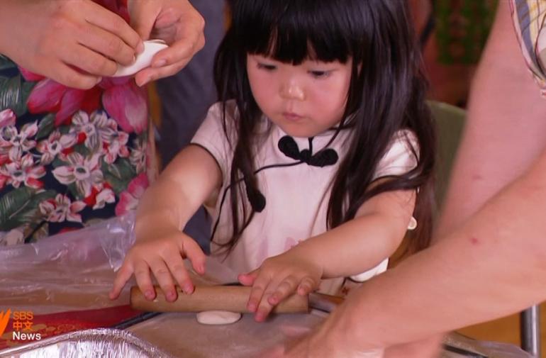 a child making cookies